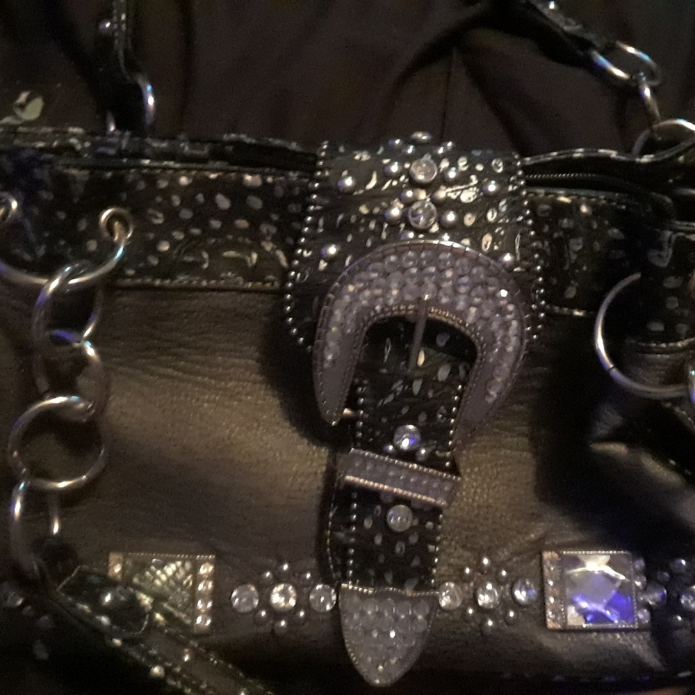 awesome gently used roustic and couture purse with